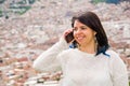 Young girl take selfie from hands with phone on summer city street. Urban life concept Royalty Free Stock Photo