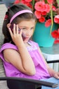 Young girl talking on the cell phone