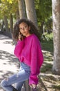 young girl talking on the phone while waiting for her boyfriend Royalty Free Stock Photo