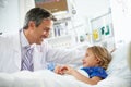 Young Girl Talking To Male Doctor In Intensive Care Unit Royalty Free Stock Photo