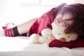 Young girl and teddy bear