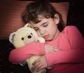 Young girl and teddy bear Royalty Free Stock Photo