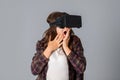 Young girl testing a virtual reality helmet Royalty Free Stock Photo