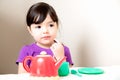 Young Girl Thinking Over Tea