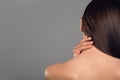 Young girl touching her neck Royalty Free Stock Photo