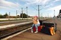 Young girl in train station Royalty Free Stock Photo