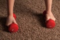 Young girl training with red dumbbell at home on floor Royalty Free Stock Photo