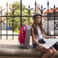 Young girl travels to Europe.