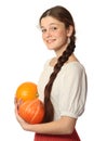 Young girl with two pumpkins
