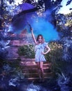 Young girl with umbrella in hand, on the stairs, which meets the bright, blue smoke.