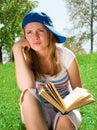 Young girl unwilling to read Royalty Free Stock Photo