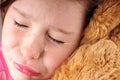 Young girl upset with bear Royalty Free Stock Photo