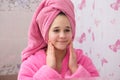 Young girl use cosmetics cream for his face in the bathroom Royalty Free Stock Photo