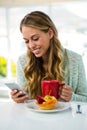 Young girl uses her phone Royalty Free Stock Photo