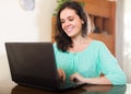 Young girl using laptop at home Royalty Free Stock Photo