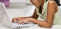 Young Girl Using Laptop for learning at home Royalty Free Stock Photo