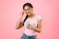 Young girl using phone for listening to music Royalty Free Stock Photo