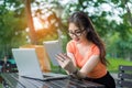 Young girl using tablet and laptop computer Royalty Free Stock Photo