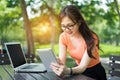 Young girl using tablet and laptop computer Royalty Free Stock Photo