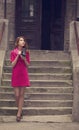 Young girl with vintage 6x6 camera at outdoor. Royalty Free Stock Photo