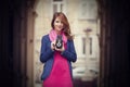 Young girl with vintage 6x6 camera at outdoor.