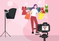 Young Girl Vlogger Takes a Clothing Recommendation Describe fashion and fabrics, Vlog, do reviews, record videos sitting in the