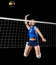 Young girl volleyball player isolated ver with ball and net Royalty Free Stock Photo