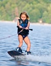 Young Girl on Wakeboard Royalty Free Stock Photo