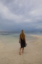 Young girl walking on a beach in Kenya Royalty Free Stock Photo