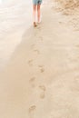 Young girl walking on the beach Royalty Free Stock Photo