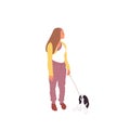 Young girl is walking with a charles king cavalier spaniel.dog on a leash. Isolated on white background. Flat style cartoon stock Royalty Free Stock Photo