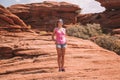 Young girl walking down the horse shoe bend cliffs Royalty Free Stock Photo