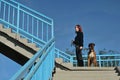 Young girl walking with her pet dog Royalty Free Stock Photo