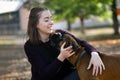 Young girl walking with her pet dog Royalty Free Stock Photo