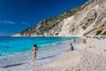 8.26.2014 - Young girl walking through the Myrtos beach, Greece, Kefalonia island