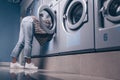 Young girl in the washing machine Royalty Free Stock Photo