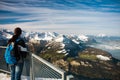 Girl watching from the Frontalpstock peak to the Lake Lucerne