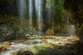 Young girl in waterfall near Panta Vrexei in Evritania, Greece