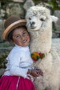 A young girl wearing a Bolivian bowler hat.