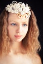 Beautiful young girl wearing handmade felt adornment