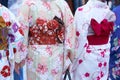 Young girl wearing Japanese kimono standing in front of Sensoji Temple in Tokyo, Japan. Kimono is a Japanese traditional garment. Royalty Free Stock Photo