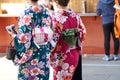 Young girl wearing Japanese kimono standing in front of Sensoji Temple in Tokyo, Japan. Kimono is a Japanese traditional garment. Royalty Free Stock Photo