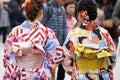 Young girl wearing Japanese kimono standing in front of Sensoji Temple in Tokyo, Japan. Kimono is a Japanese traditional garment. Royalty Free Stock Photo