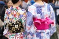 Young girl wearing Japanese kimono standing in front of Sensoji Temple in Tokyo, Japan. Kimono is a Japanese traditional garment. Royalty Free Stock Photo