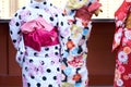 Young girl wearing Japanese kimono standing in front of Sensoji Temple in Tokyo, Japan. Kimono is a Japanese traditional garment. Royalty Free Stock Photo