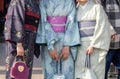 Young girl wearing Japanese kimono standing in front of Sensoji Temple in Tokyo, Japan. Royalty Free Stock Photo