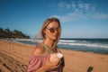 Young girl wearing sunglasses walking down Royalty Free Stock Photo