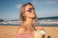 Young girl wearing sunglasses walking down Royalty Free Stock Photo