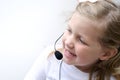 Young Girl wearing telephone headset