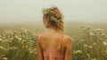 Young girl wearing a wreath of wild flowers on her head, walking in the green misty meadow. Harmony with nature. Generative AI